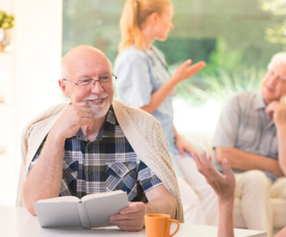 Residents chatting in a living room