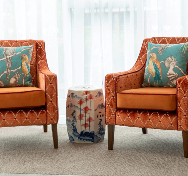 Two orange armchairs